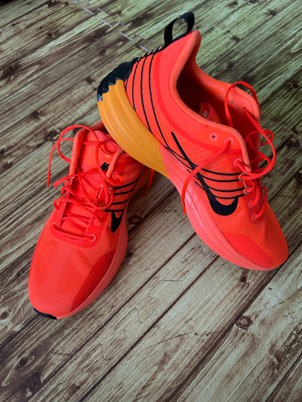 Nike Men's Bright Orange and Black Athletic Running Shoes with Yellow Accents